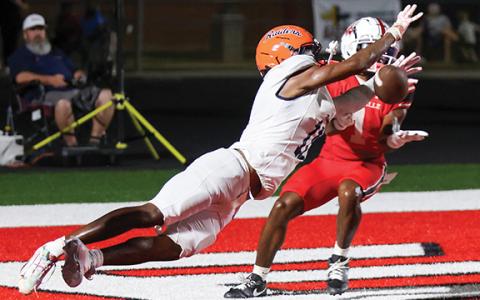 Habersham Central senior defender Jay Feltus (11) makes a play on the ball during a high school football game between Habersham Central and Loganville at Red Devil Stadium on Friday, Sept. 18. (Landen Todd/Staff)