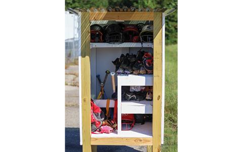 The box sits at the Diamond Memorial Fields next to the Habersham Fairgrounds and it operates similar to Little Free Library, but for sports equipment. (Landen Todd/Staff)