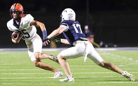 Habersham Central defensive back Sutton Porter (25) picks the ball off during the football game between Habersham Central and Apalachee Friday night. (Landen Todd/Staff)