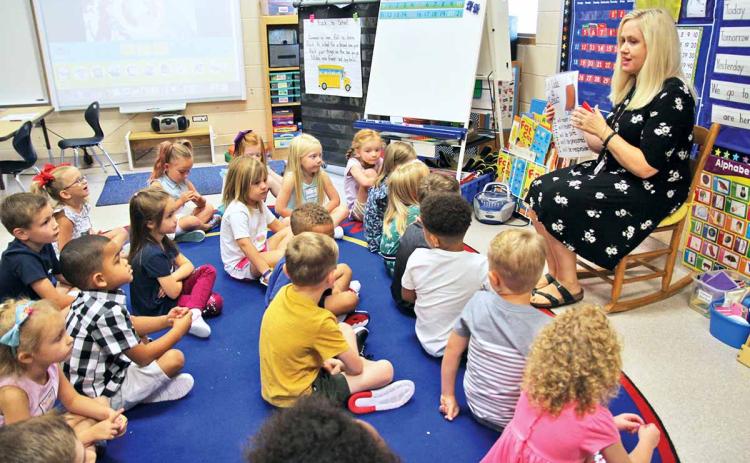 Habersham County Schools, along with the thousands of students who attend them, returned to “class as usual” Wednesday, Aug. 7. Shown is Clarkesville Elementary School kindergarten teacher Kristi Thurmond explaining classroom conduct to her students the morning of the first day of school. Prior to the first day, students and their parents/guardians turned out for open houses earlier this week. For additional back-to-school photos, see Page 6A, this edition.