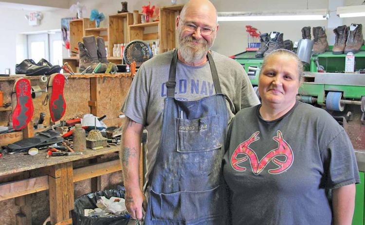 Becky and Billy Bending have owned Country Cobbler Shoe Repair in Cornelia for nearly five years. Billy Bending has been a cobbler for over 30 years and Becky Bending has been in the profession for over 20 years. (Photo/ERIC PEREIRA)