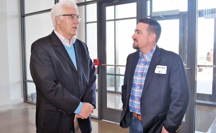 Habersham Partnership for Growth/Economic Development Council Executive Director Tim Lee, left, chats with Kevin Wood, owner of Wood’s Mercantile in Clarkesville, earlier this year on the Clarkesville campus of North Georgia Technical College. Lee died Sunday at the age of 62 from complications due to cancer. (Photo/HABERSHAM CHAMBER OF COMMERCE)