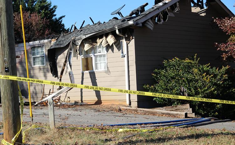 Authorities are requesting the public’s assistance with information leading to the arrest and conviction of someone responsible for arson at a home on 459 Irvin St. in Cornelia. The fire occurred early Monday morning. Photo by ERIC PEREIRA
