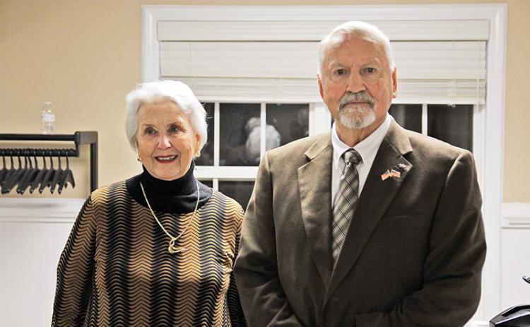Council members Florence Wikle and John Popham were celebrated by friends and family at their last city council meeting.