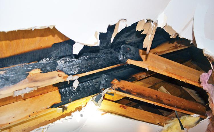 The attic of a Demorest apartment was damaged by fire. Photo courtesy of the Insurance and Safety Fire Commissioner’s Office