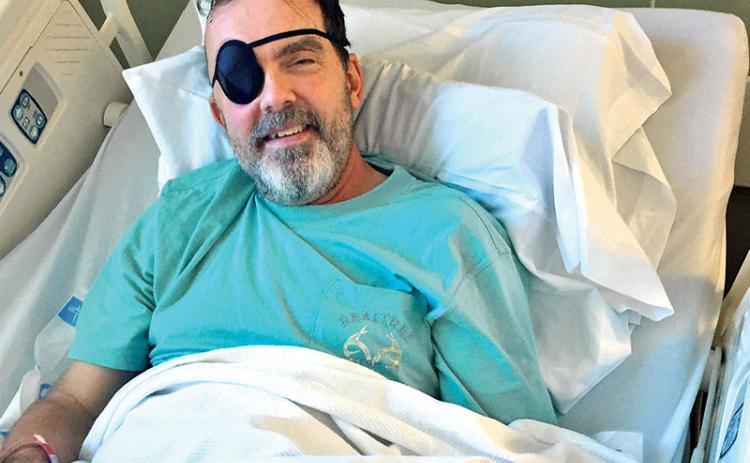 Scott Brady gets some rest after his brain surgery. Brady was about to have his organs harvested when doctors realized he had an improbable chance to survive.
