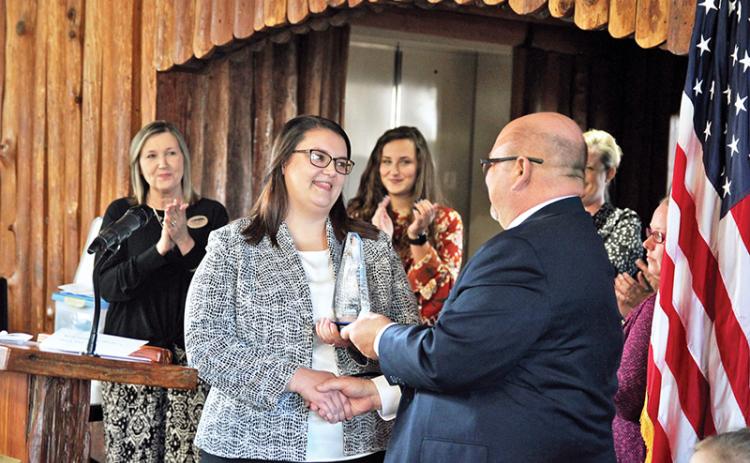 North Georgia Tech College President Dr. Mark Ivester hands the GOAL award to Dietra Gray.