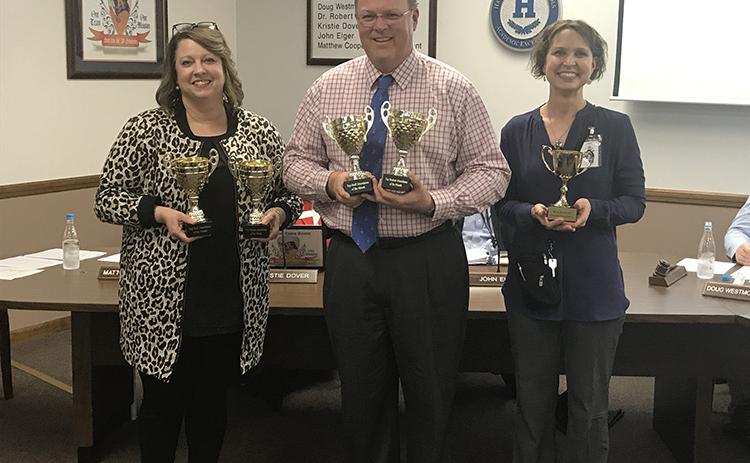 Attendance winners for January were honored at Monday’s Habersham County Board of Education meeting, including double winners for student and faculty attendance Habersham Ninth Grade Academy, represented by Principal Connie Franklin (left), and Baldwin Elementary, represented by Principal Rodney Long. The most improved attendance award went to Woodville Elementary, represented by Susan Davis (right).