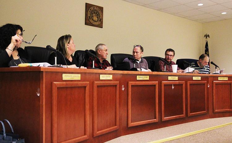 From left are Baldwin City Council members Stephanie Almagno, Alice Venter, Theron Ayers, Mayor Joe Elam, and councilmen Jeff Parrish and Larry Lewallen at Monday’s meeting.