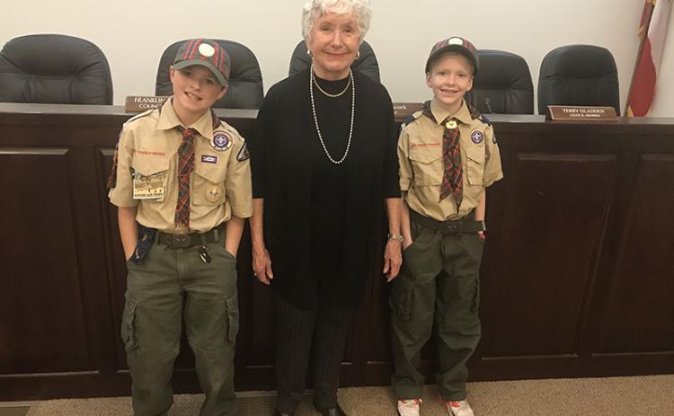 Clarkesville Pack 5 Cub Scouts Finn Jackson (left) and Zachary Klemm met with Clarkesville Mayor Barrie Aycock before and after Monday’s city council meeting to learn about government for their Arrow of Light requirement.