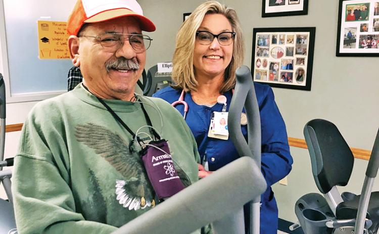 Lisa Reiss, Program coordinator for HMC’s cardiac and pulmonary rehab program, works with patient Jesse Garcia.