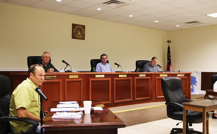 Baldwin Mayor Joe Elam speaks during the Monday city council meeting. Behind him are Councilmen Theron Ayers, Jeff Parrish and Larry Lewallen.