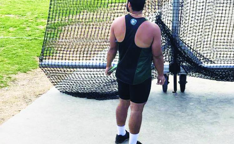 Piedmont's Addison Mock gets ready to throw in a track meet March 9.