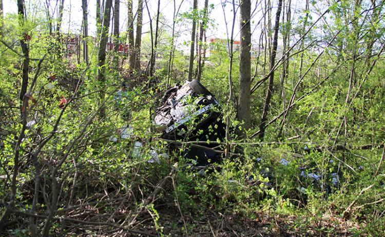 The vehicle landed deep in the woods by State Route 365 southbound.