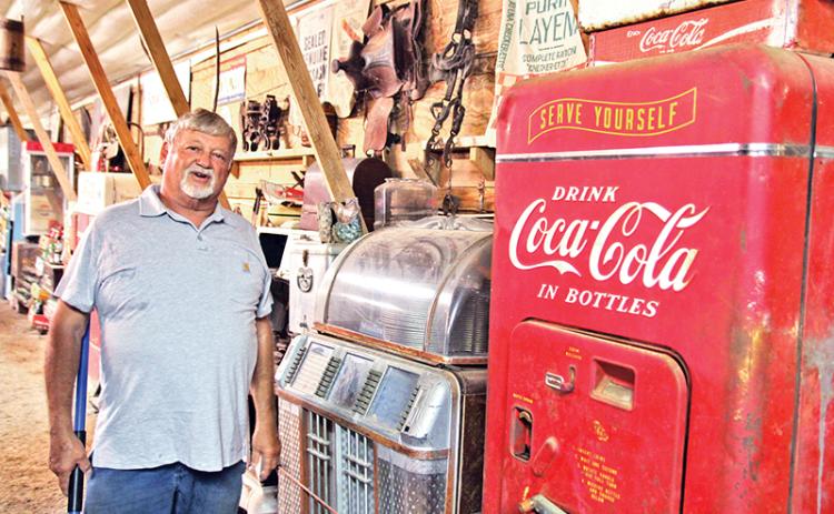 Bobby Irvin gives a tour of the chicken coop he converted in a bluegrass venue which has hosted several local and recognizable names in bluegrass music.