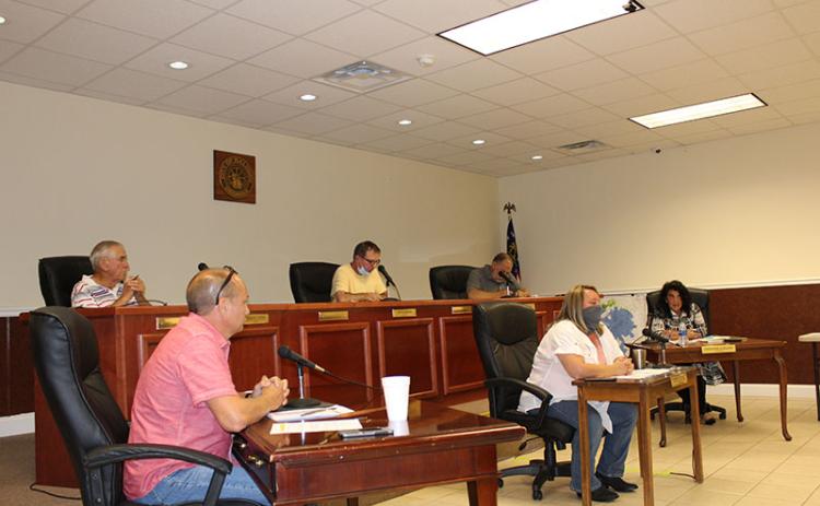 Baldwin's City Council listens as Councilman Jeff Parrish explains that the city entered into a separation agreement with former City Administrator Jerry Neace “for the convenience of the council.”