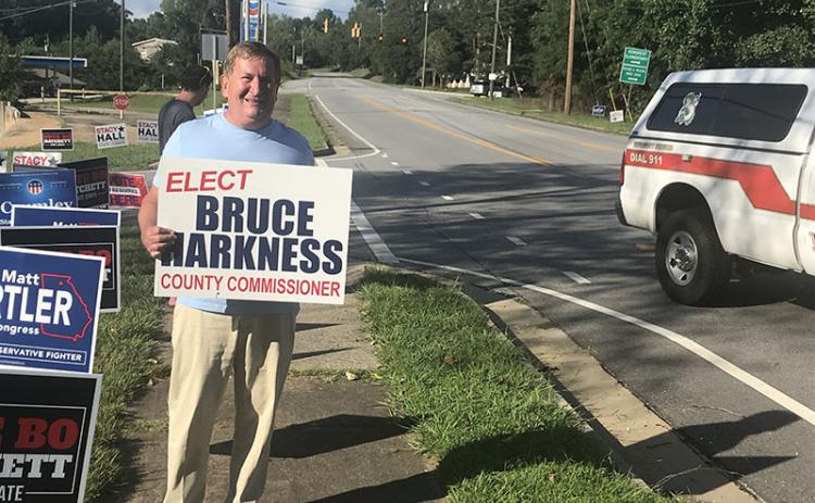 Bruce Harkness was stumping for himself in Demorest right up until polls closed Tuesday night. He will represent District 4 starting in January.