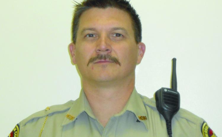 Shawn Gragg currently owns an upholstery business and formerly was in law enforcement collectively for 22 years (shown in uniform in 2017).