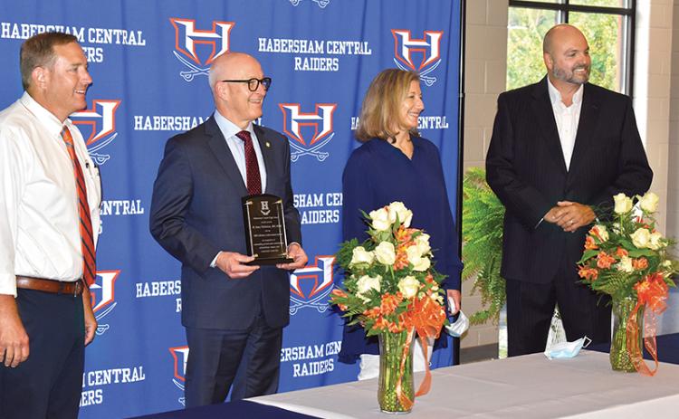 Dr. Stacy Nicholson (second from left) accepts Habersham Central High School’s first lifetime achievement award from Principal Jonathan Stribling, Gifted Coordinator Martha Cantrell and Superintendent Matthew Cooper at a ceremony Friday night.