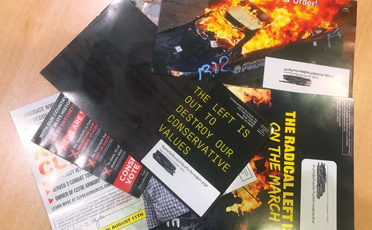 Political flyers with extreme messages have been hitting mailboxes for weeks leading up to Tuesday’s runoff election.