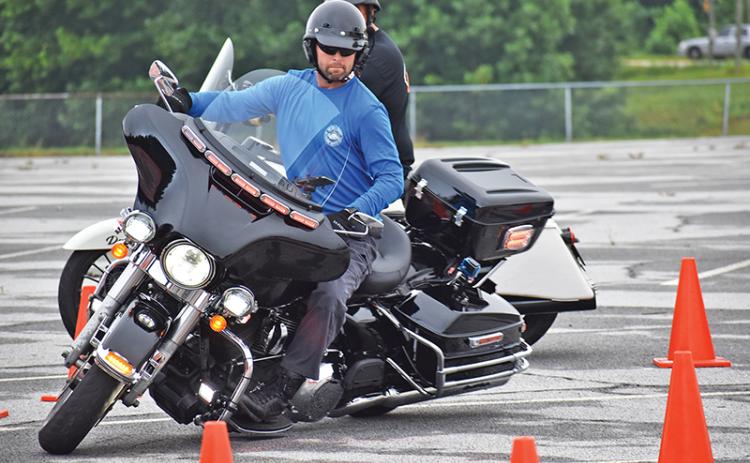 Hunter Hendricks moves about the practice course before the expert division skills challenge events in Clarkesville on Saturday.