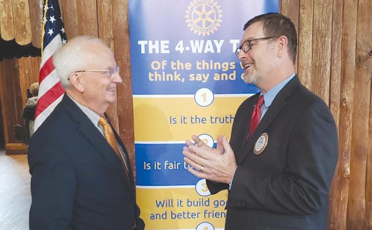 Georgia Agriculture Commissioner Gary Black (left) speaks with Philip Smith, President of the Rotary Club of Habersham County. ALAN NESMITH/Staff