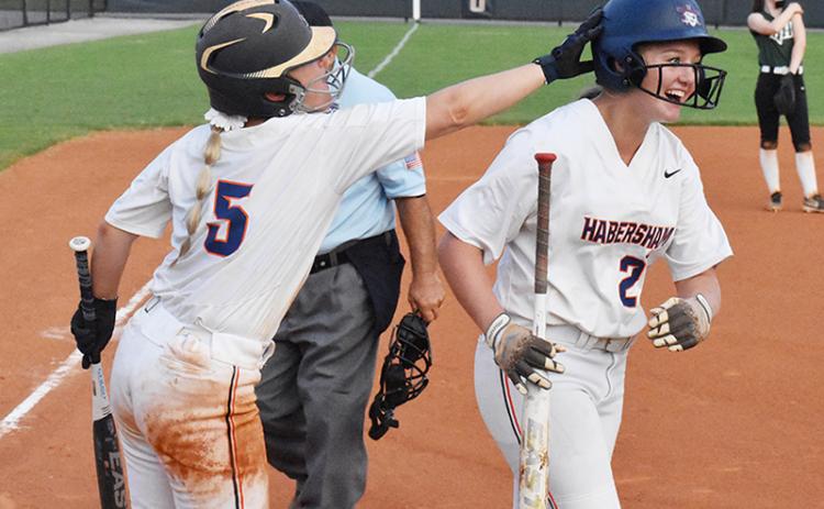 Brayden Staton and Preslee Hix celebrate after Hix’s sixth-inning go ahead home run. Photo by CODY ROGERS/Staff
