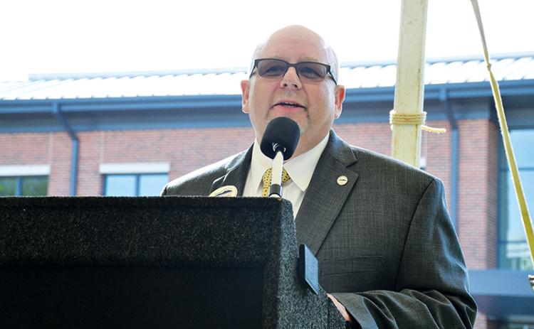 Dr. Mark Ivester speaks at the ribbon cutting ceremony of the Industrial Technology Center at the North Georgia Technical College Clarkesville campus in 2019.