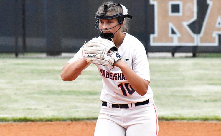 Kyla Quiles prepares to pitch against a powerhouse Buford Wolves batting order.
