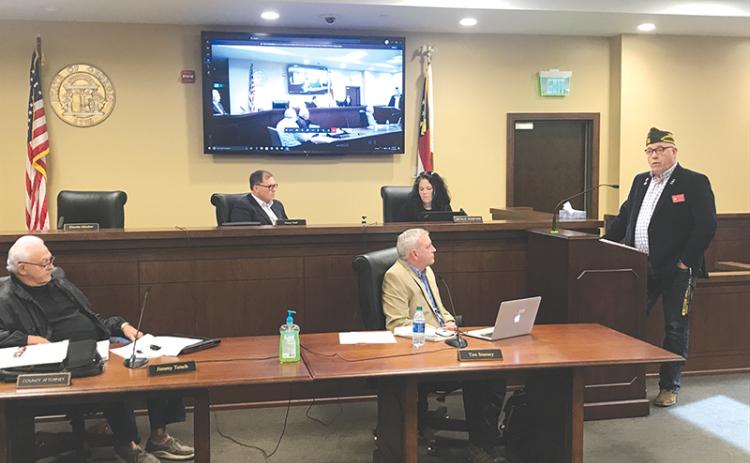 VFW District Commander Bill Miles talks at Monday’s Habersham County Board of Commissioners meeting. Listening are Commissioners Jimmy Tench and Tim Stamey (bottom row), Stacy Hall and Natalie Crawford (top row).