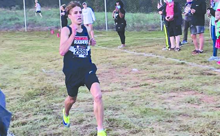 Habersham Central’s Andrew Kivett overcame an injury to win the regional cross country meet.