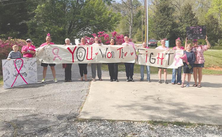 Friends and colleagues of Becky Griffin greeted her as she came home from her last radiation treatment in April with a hero’s welcome.