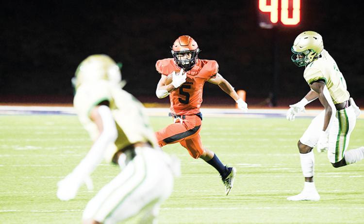 Habersham Central’s Jackson Clouatre always has his eyes downfield, planning his next move. TOM ASKEW/Special