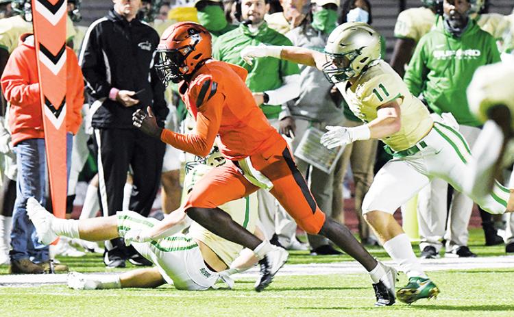 Habersham Central’s Joshua Pickett escapes a Buford defender earlier this season. TOM ASKEW/Special