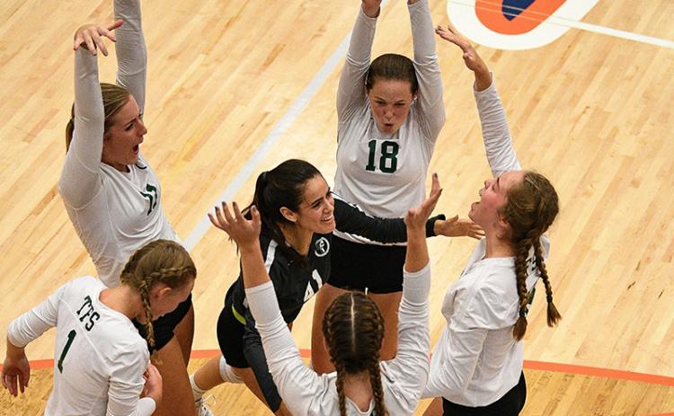 Tallulah Falls’ volleyball team celebrates a point during their win Tuesday. BRIAN CARTER/Special