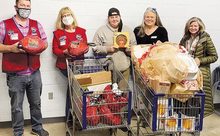 Shown (from left) are Lowe’s Cornelia Store Manager Jeremy Gattis, Lowe’s Cash Management Specialist Marianne Longerbone, Family Resource Center Home Visiting Coordinator Melanie Allen, volunteer Cynthia Wade and Family Resource Center Board Member Leigh Johnson. MELANIE ALLEN/Submitted