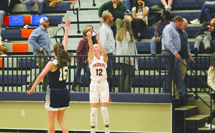 Habersham Central’s Kelsey Banks launches a shot against Prince Avenue Christian before the Christmas break.