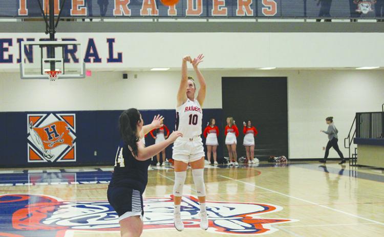 Habersham Central’s Taylor Wade launches from deep against Prince Avenue Christian on Monday night.