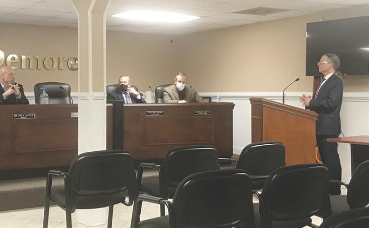 New Demorest City Attorney Thomas Mitchell (right) talks with the city council Tuesday night, including (from left) Mayor Rick Austin and Councilmen Jim Welborn and Nathan Davis.