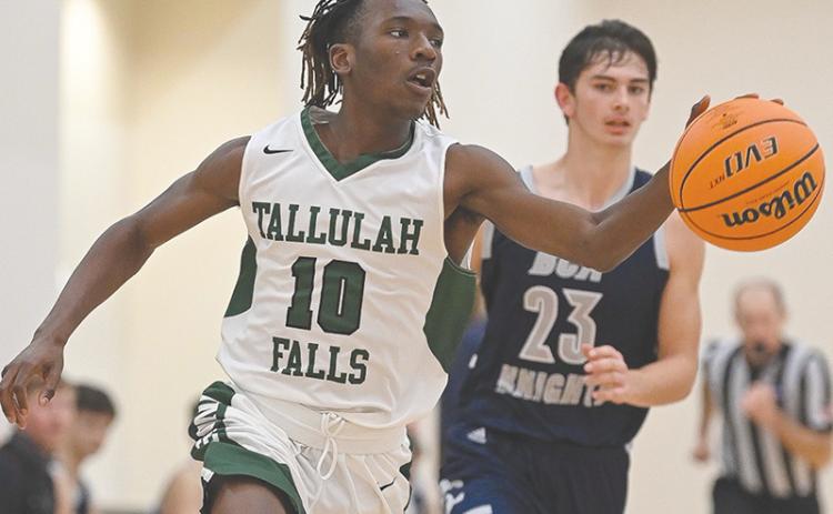 Tallulah Falls’ Simeon  Respress takes off down court during Friday’s win over George Walton Academy. RANDY CRUMP/Special