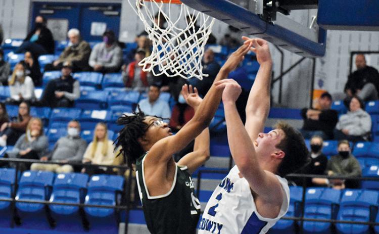 Tallulah Falls’ Julian Gober blocks Towns County’s Jake McTaggart during a Dec. 3 game. The Indians have not lost since that night 50 days ago.