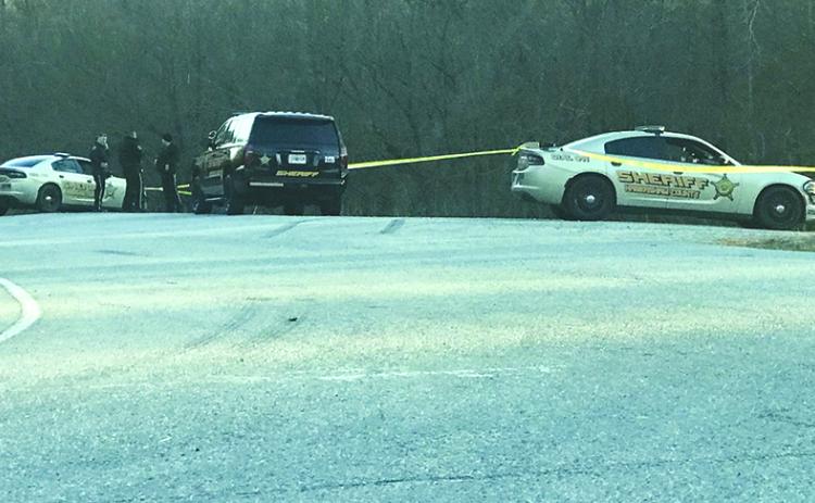 Habersham County Sheriff’s deputies gather near the White County line on Highway 115 Monday afternoon to investigate a shooting.