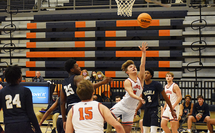 Habersham Central’s Cade Williams drives to the basket and converts on a layup for two of his 13 points.
