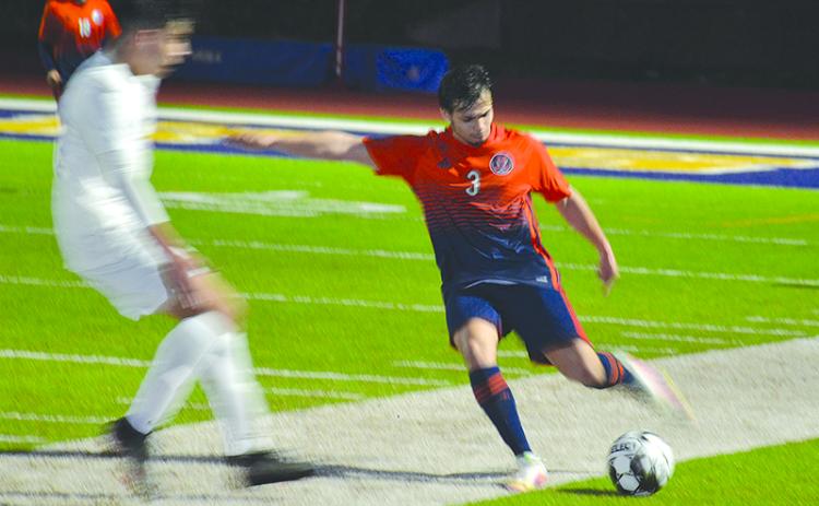 Habersham Central’s Angel Zavala boots the ball downfield during Tuesday night’s win over Gainesville.