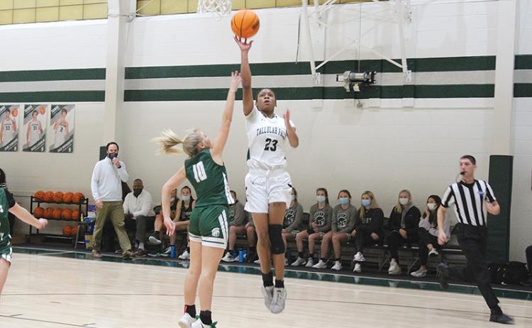 Denika Lightbourne elevates for a layup in Tallulah Falls’ 10-point loss to Athens Academy in the region championship. The sophomore finished with a team-high 20 points in the loss.