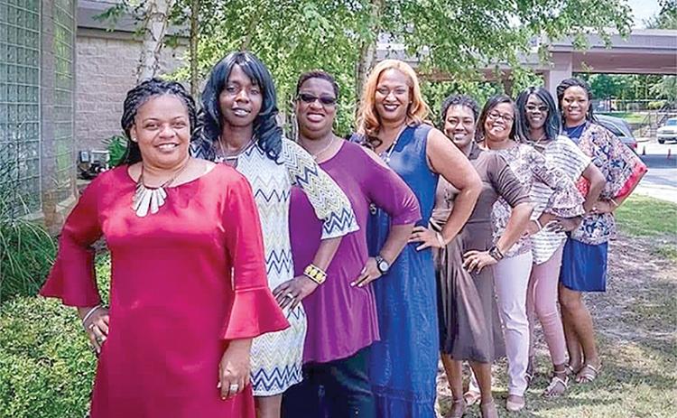 Members of the Reading Divas at the height of their membership included (front to back) Monique Rucker, Tanya Rucker, Tara Young, author Kimya Motley, Lisa Teasley, Kerri Davis, Christie Babers and Talara Deshazer.