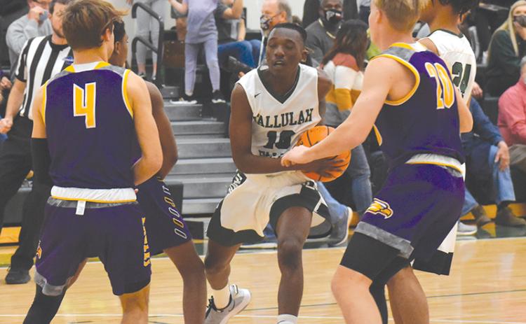 Tallulah Falls' Simeon Respress weaves through traffic during the Indians' win over Athens Christian.