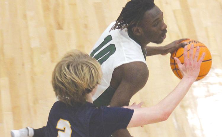 allulah Falls’ Simeon Respress looks for an open teammate with Galloway’s Quinton Alterman defending.
