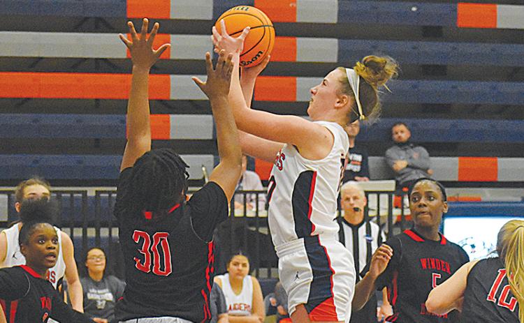 Habersham Central’s Taylor Wade looks to score inside against Winder-Barrow on Tuesday night.