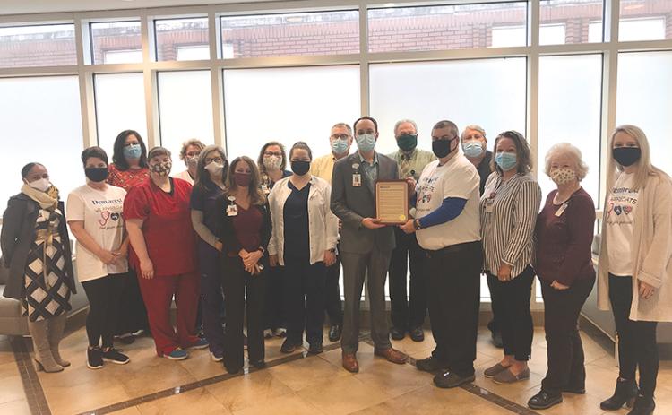 From left, Kesha Clinkscale, VP, Culture & Wellness; Demorest City Manager Kim Simonds; Valeria Lewis, Sara Black, Karen Phillips, Acute Care Manager; Jamie Mentzer, Angela Harpold, COO; Crystal Corbin; Samantha Ramey; Michael Armstrong, Director of Operations; Tyler Williams, CEO; Demorest Councilman Shawn Allen; Jeffrey Laird, Accounting Manager; Dee Dillin, Radiology Manager; Lisa Ferguson, Lisa Ferguson, Patient Services; Barbara Payne, Patient Services; and Demorest utility clerk Megan Chastain.